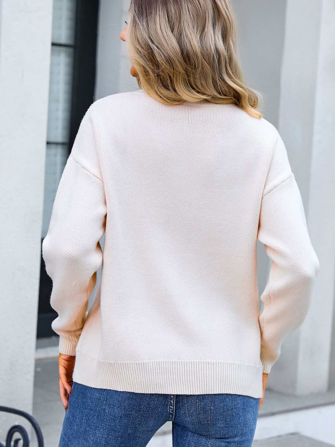 Angel Wings Bow Round Neck Dropped Shoulder Sweater in white, back view.