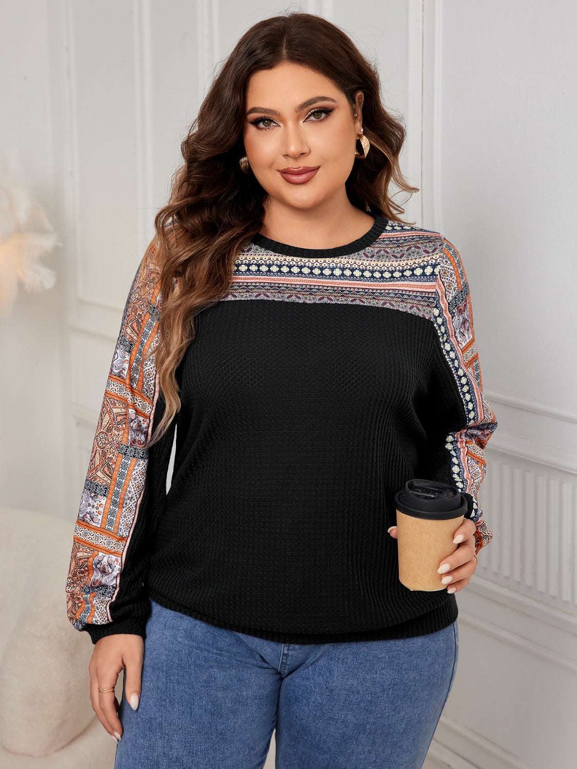 Plus size printed long sleeve sweatshirt with basic style and slightly stretchy material.