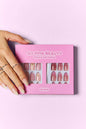 SO PINK BEAUTY Press On Nails 2 Packs with 48 pieces, featuring two distinct stylish designs for versatile looks.