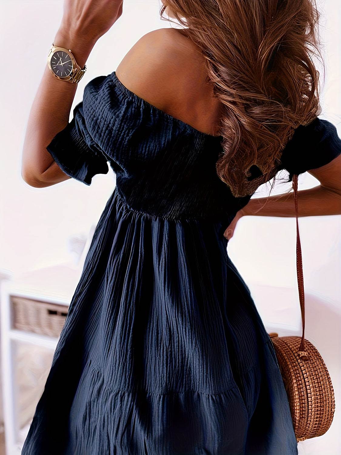 Full size ruffled off-shoulder short sleeve dress with ruched detailing.