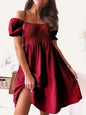 Full size ruffled off-shoulder short sleeve dress in red, featuring ruched design.