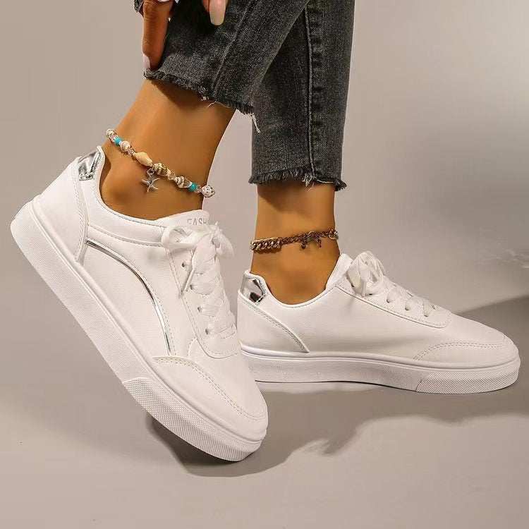 PU Leather Round Toe Flat Sneakers in white with rubber soles.