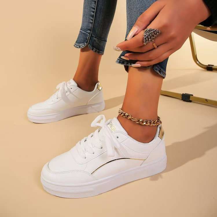 PU leather round toe flat sneakers with rubber sole.