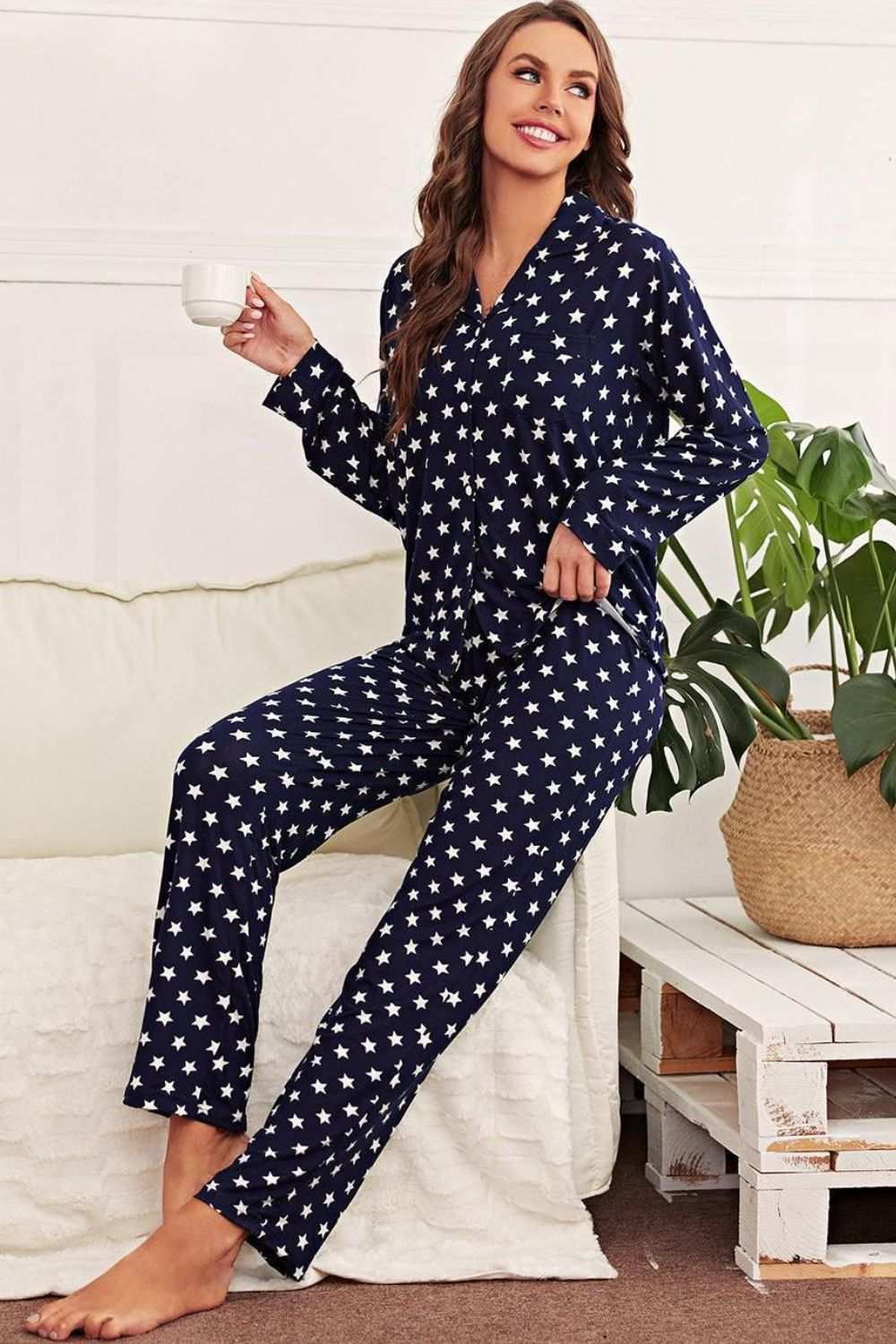 Star print button-up shirt and pants lounge set with lapel collar and long sleeves.