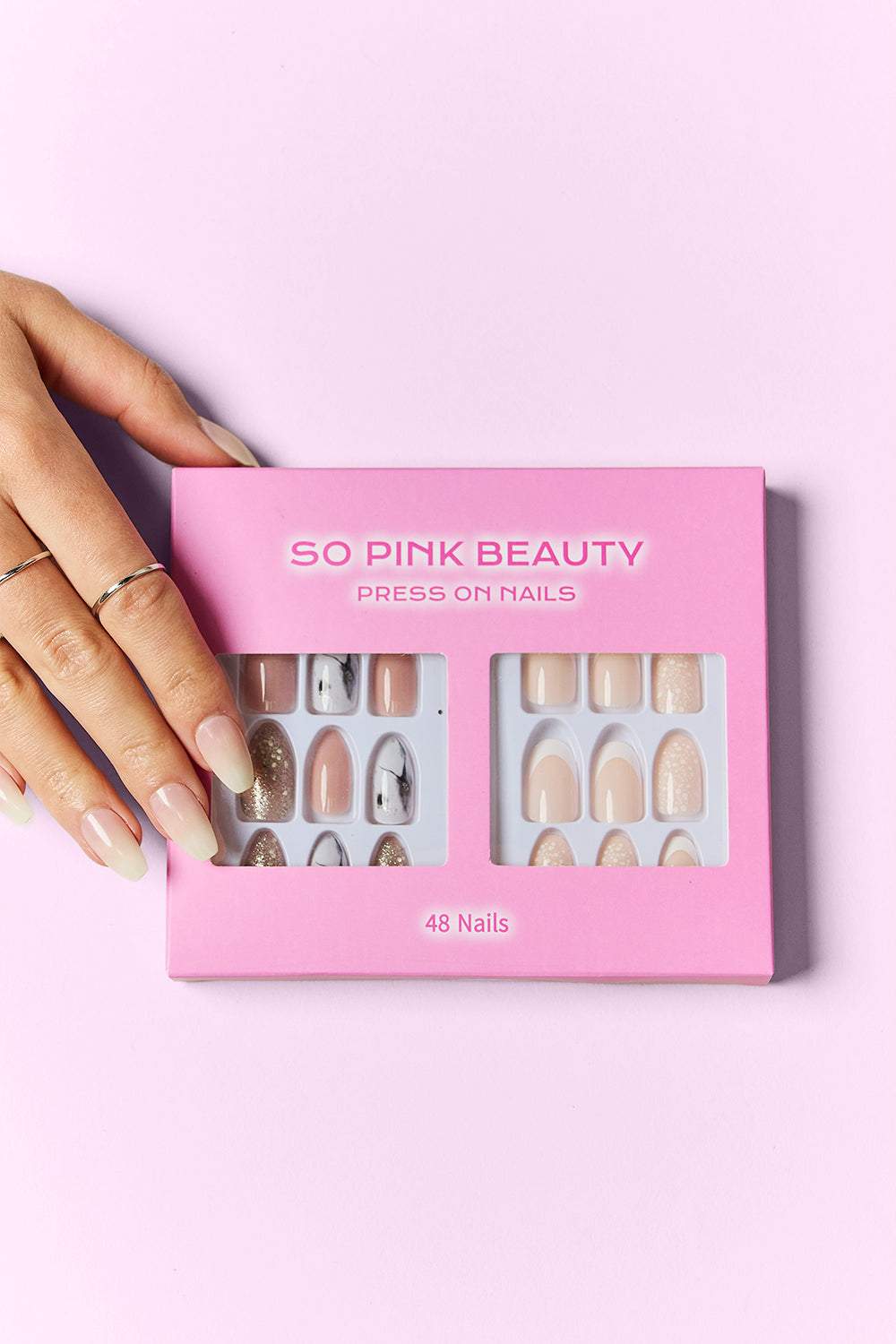 SO PINK BEAUTY Press On Nails 2 Pack with two unique designs, includes 48 pieces and glue for easy application.