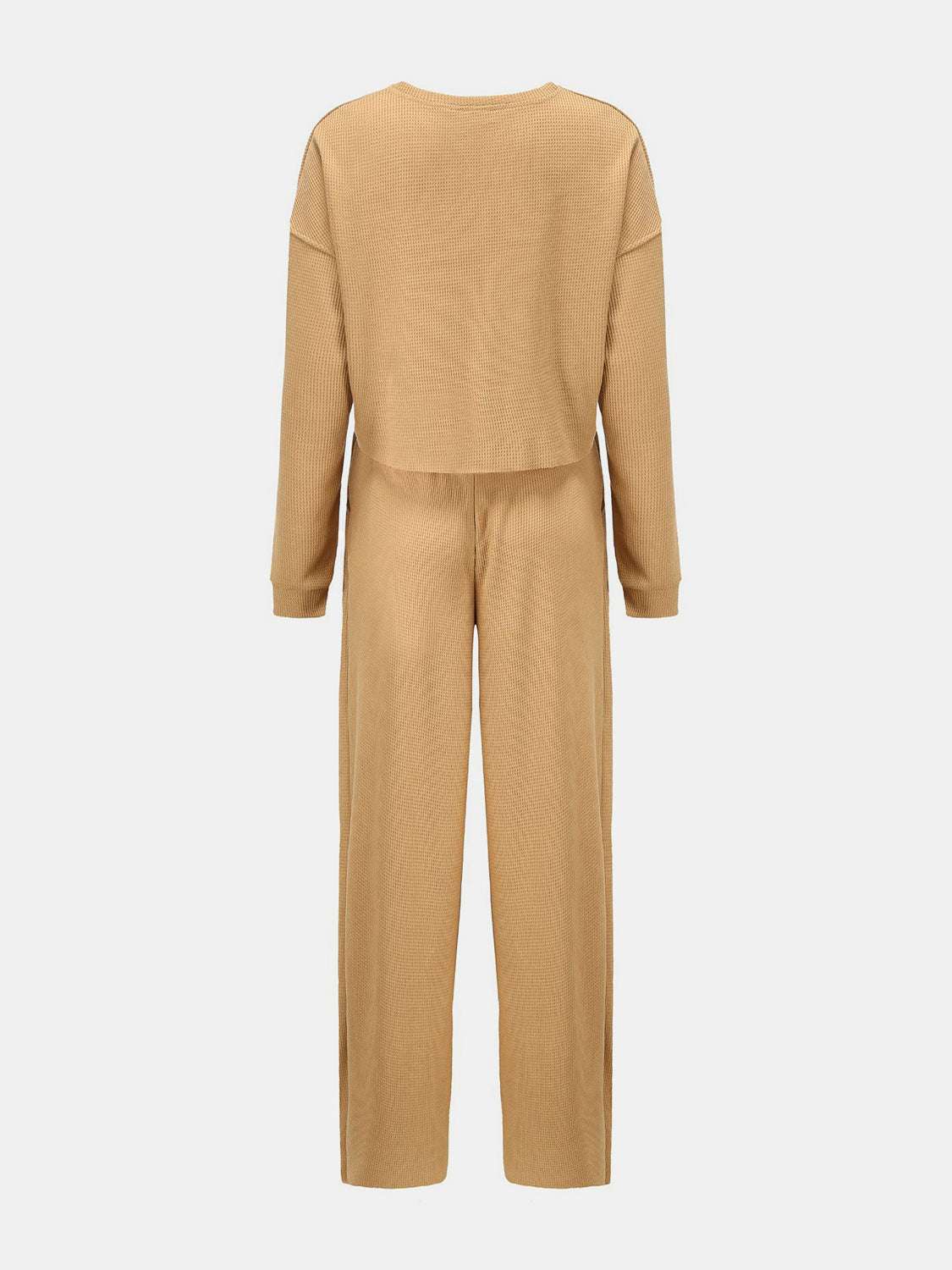 Waffle-knit round neck top and pants set in beige, two-piece, slightly stretchy material.