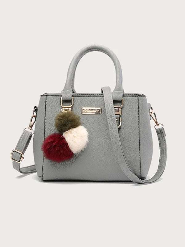 Women's handbag fashion all-match shoulder bag in grey with pom-pom decoration, PU material.