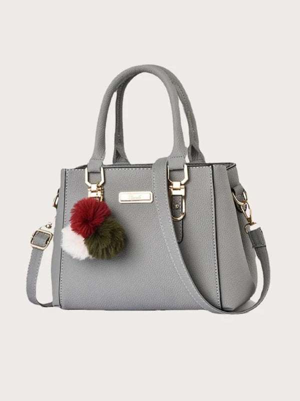 Women's all-match gray shoulder bag with pom-pom accessory, PU material, spring-summer style.