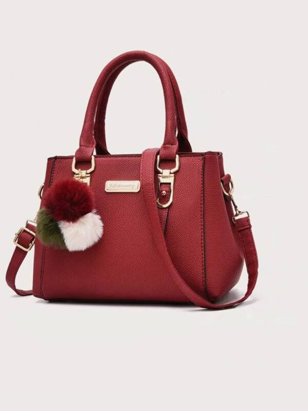 Women's red handbag fashion all-match shoulder bag with detachable strap, PU material, and decorative pom-pom, perfect for spring-summer outings.